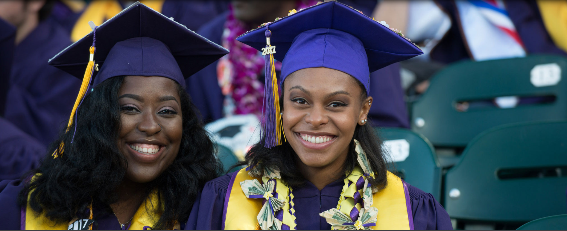 Two female students at graduation